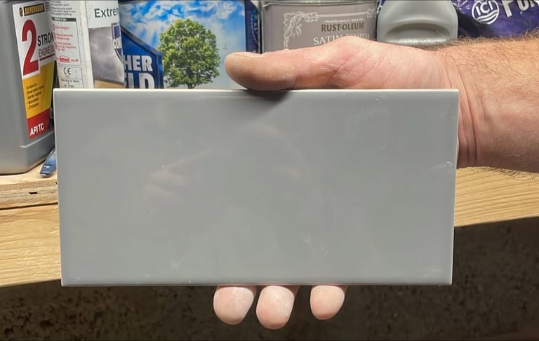 Box of grey tiles 