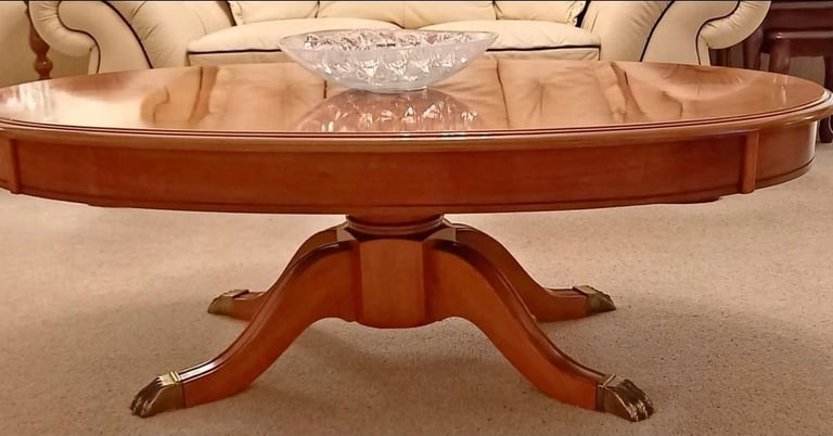 image for Statement Oval Mahogany Coffee Table