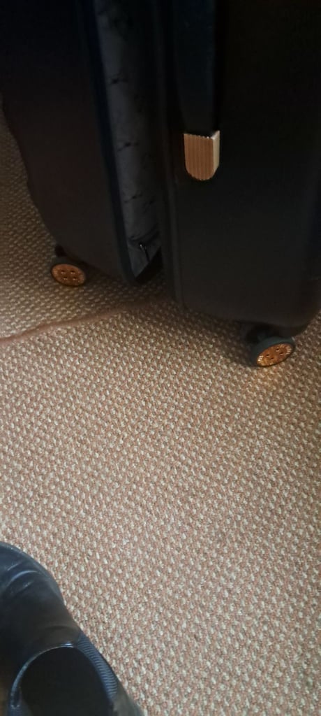 Black 4 wheel suitcase 