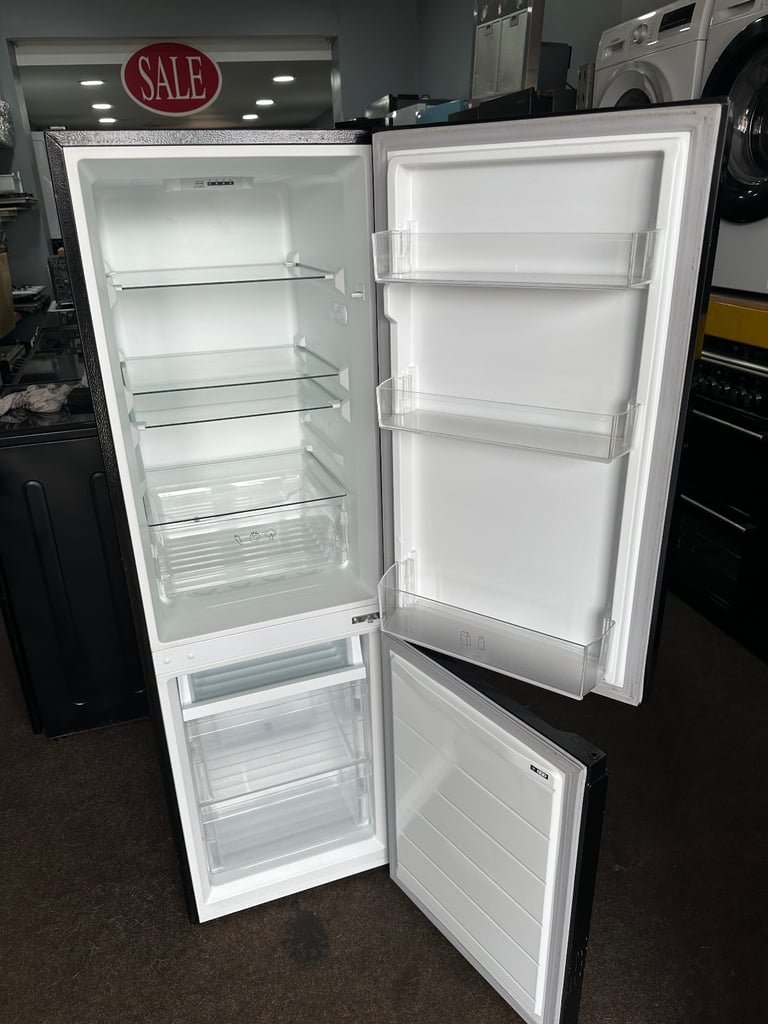 Logik black top condition frost free medium fridge freezer 