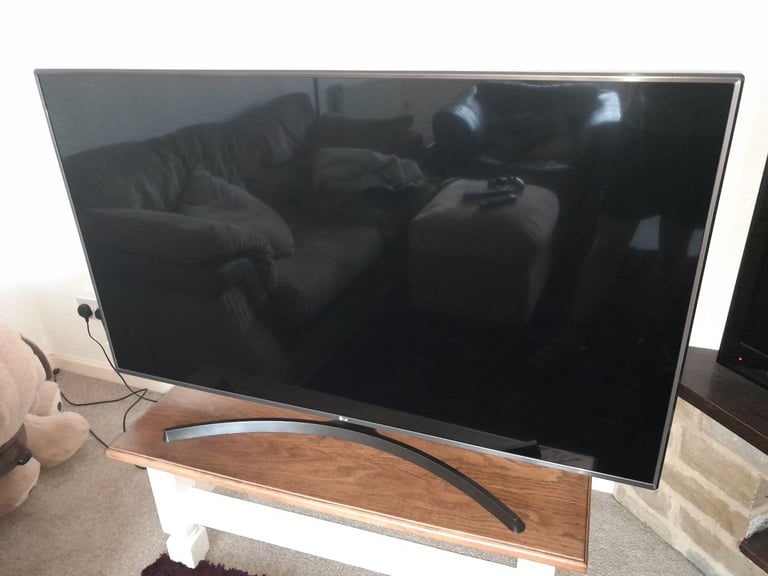 LG 55 inch 4K Ultra HD HDR Smart LED TV with two remotes