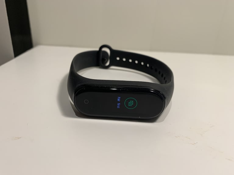 image for New Xiaomi Band 4 with charger and wristband