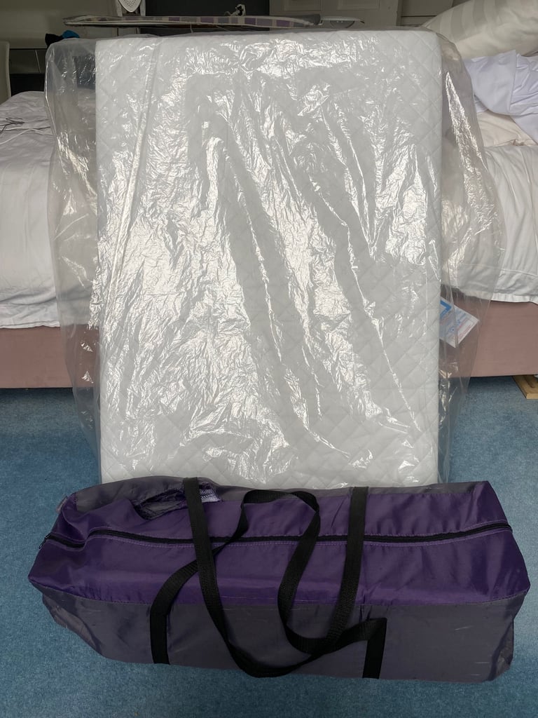 image for Travel cot plus extra comfy mattress