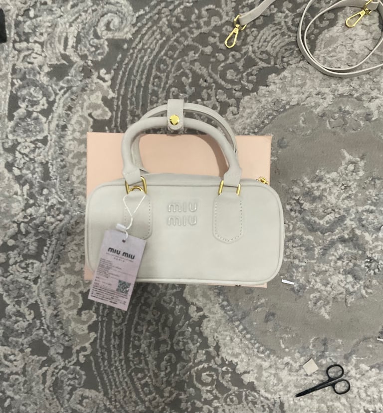 Assortment of designer women’s handbags