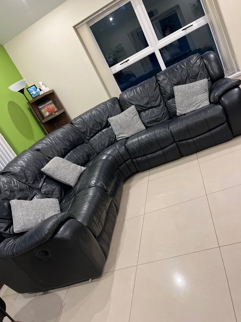 Black leather corner sofa and chair 