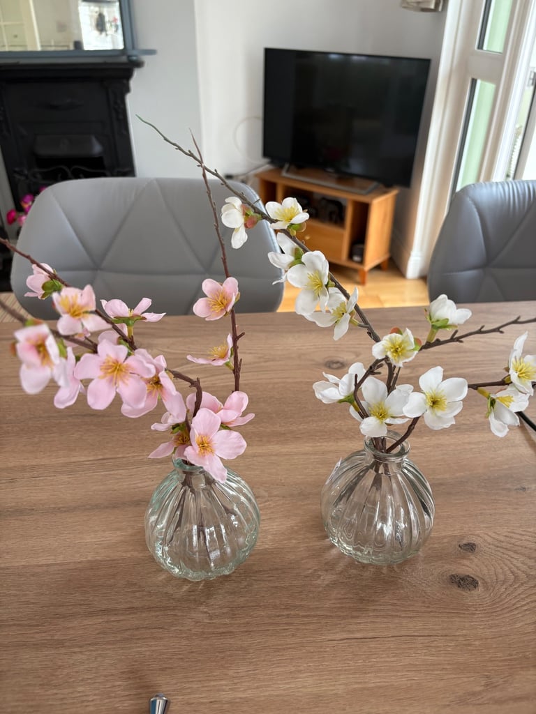 Artificial cherry blossoms in vase 