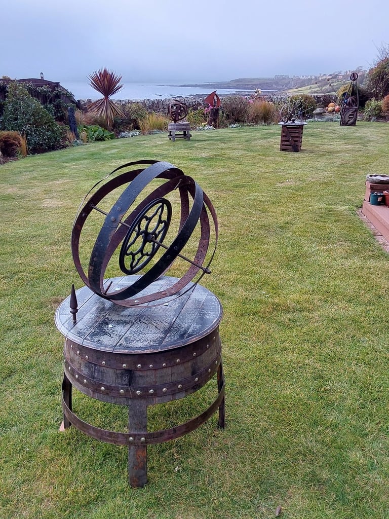 Garden art from whisky barrel materials 