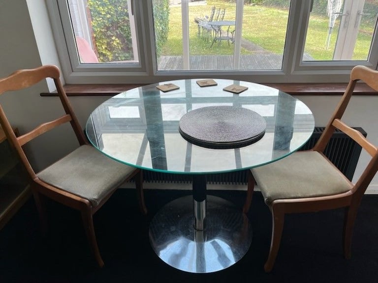 image for Glass table and 2 wood dining chairs 