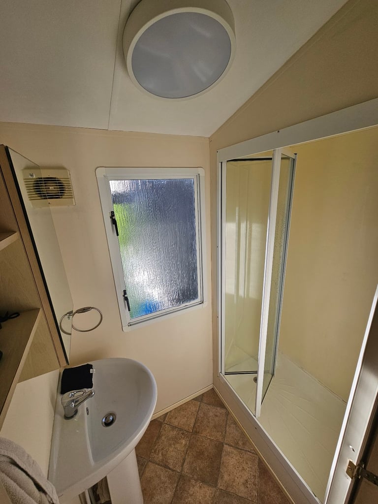 Static caravan with timber structure