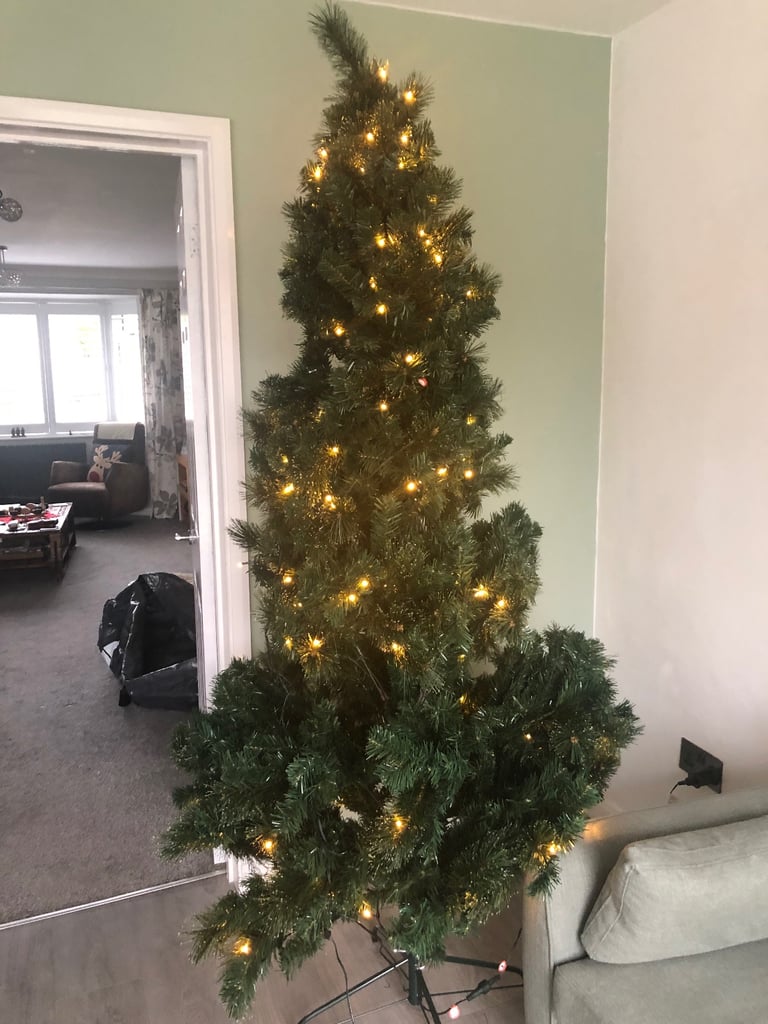 Pre-lit Majestic Dew Pine Christmas Tree complete with storage bag