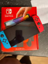 Nintendo switch OLED perfect conditions + games 