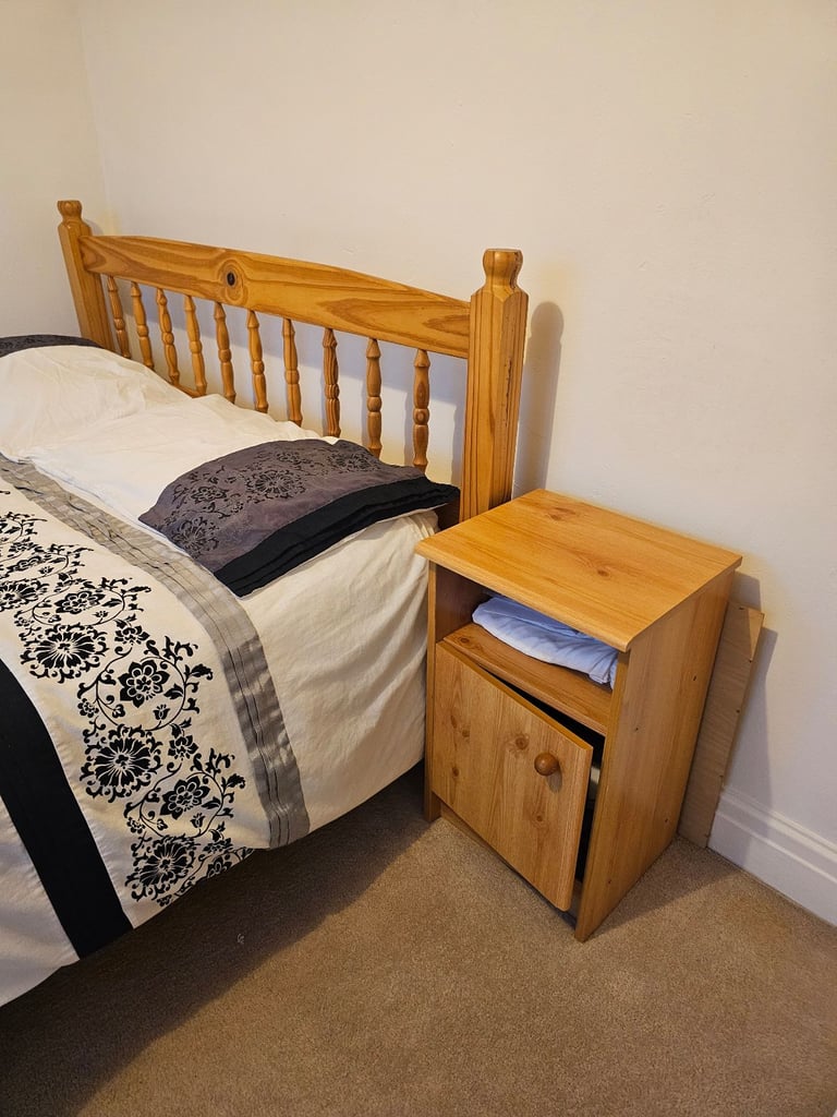 Pine double bed mattress and side table.