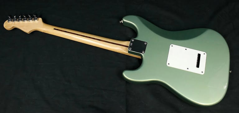 Mexican Fat Strat, Guitar bag, Guitar strap, Guitar stand, Guitar Tuner. 