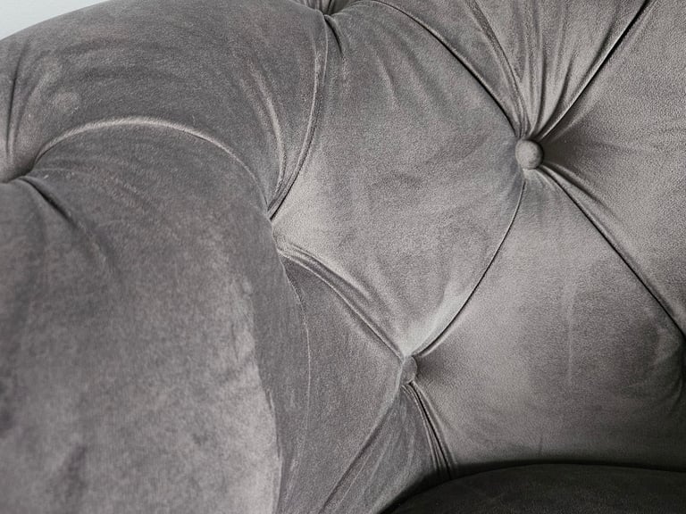 Grey accent chair.