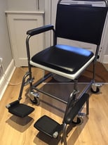 Wheeled Commode chair, brand new with lockable castors and footplates 