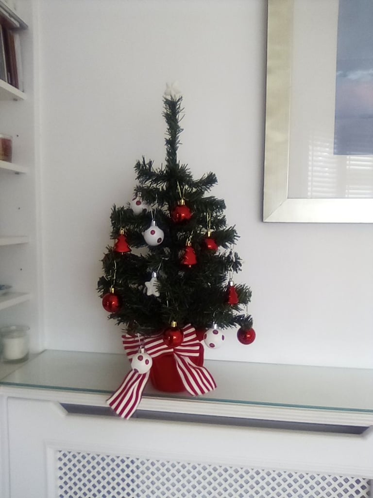 As new small Christmas tree with hanging baubles etc included.