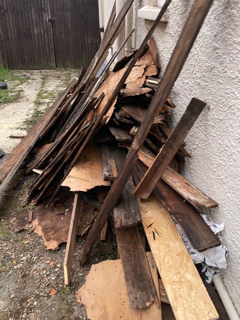 Wood planks and scrap wood from shed roof