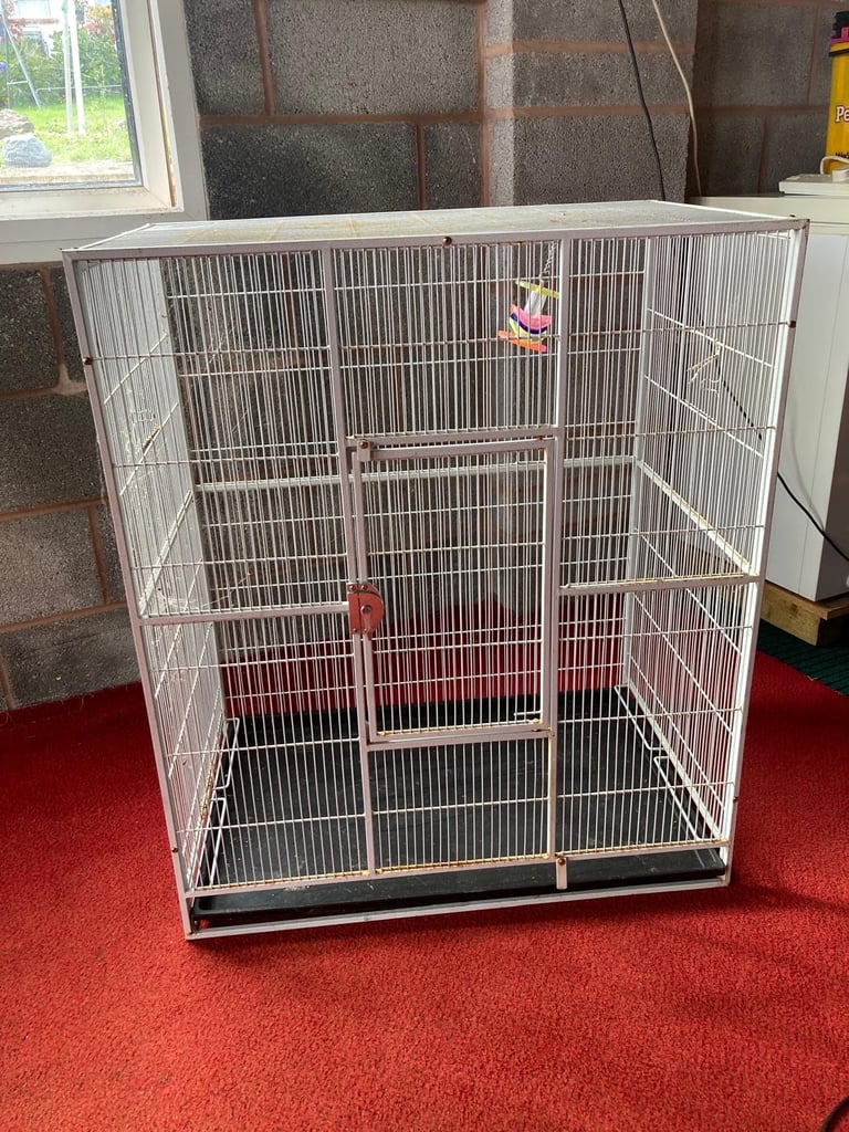 2 identical bird / parrot cages