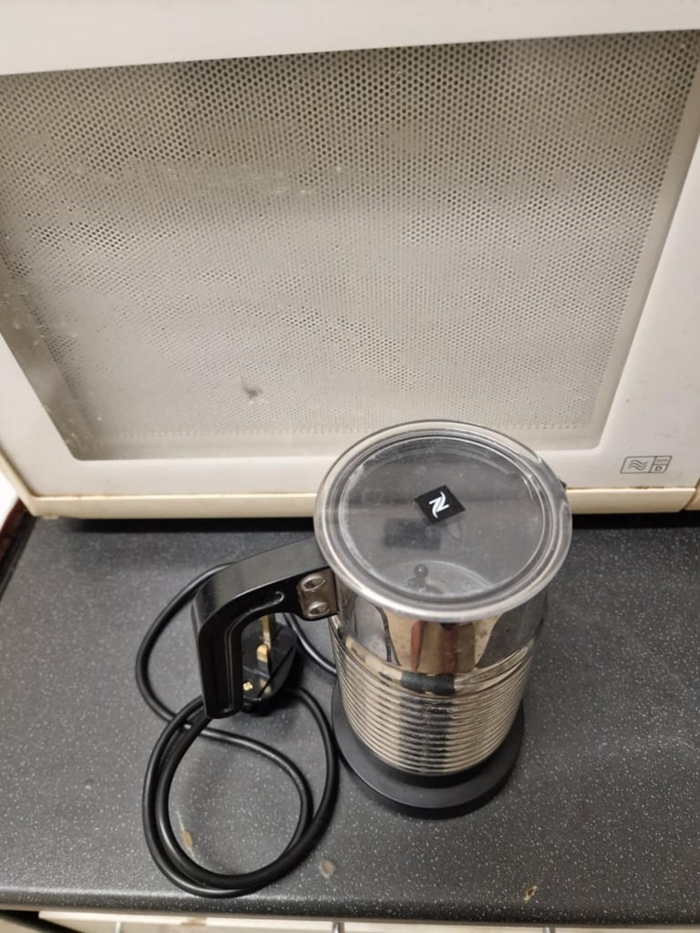 Nespresso coffee machine with milk frother for sale 