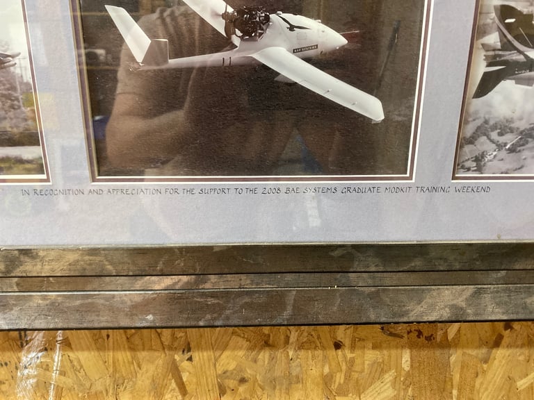 Six war planes in picture frame