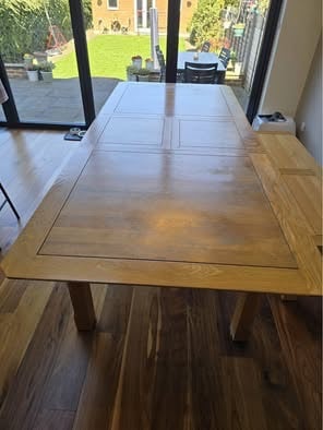 Oak Furnitureland solid oak extendable dining table, bench and 6 chairs