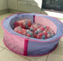 Girls ball pit with 4 bags of balls to match.