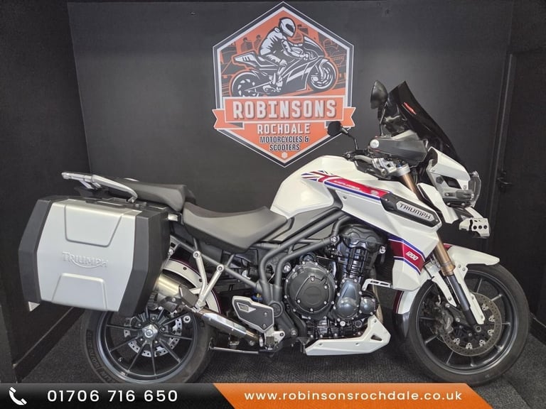 2013 Triumph Tiger Explorer 1215 in white with luggage.