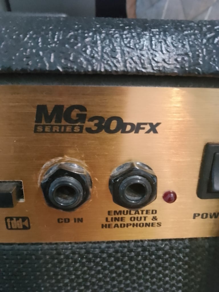 image for Marshall MG30 DFX amp with a marshall Jackhammer peddle and 2 leads with headphones 