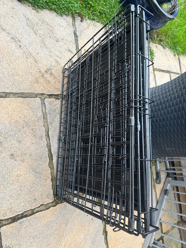 Lovely black dog crate for small/toy dog.