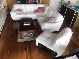 L shaped white leather sofa for sale. Now sold