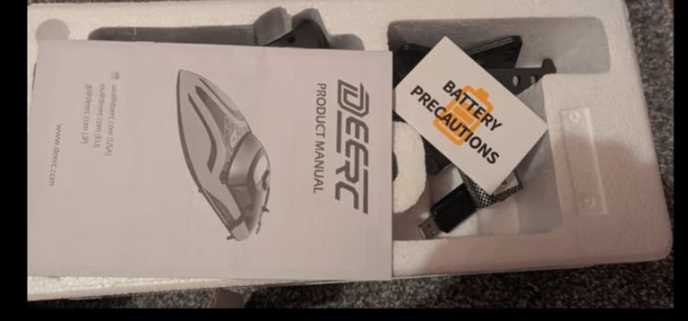 Remote controlled toy motor boat