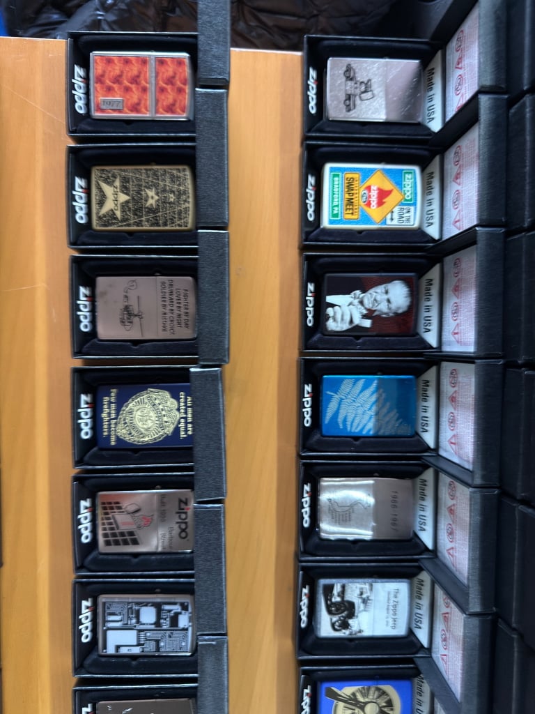 Zippo premium collection 104 lighters, display cases plus extras brand new unused 