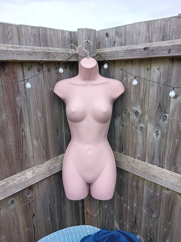 Plastic dummy on hook