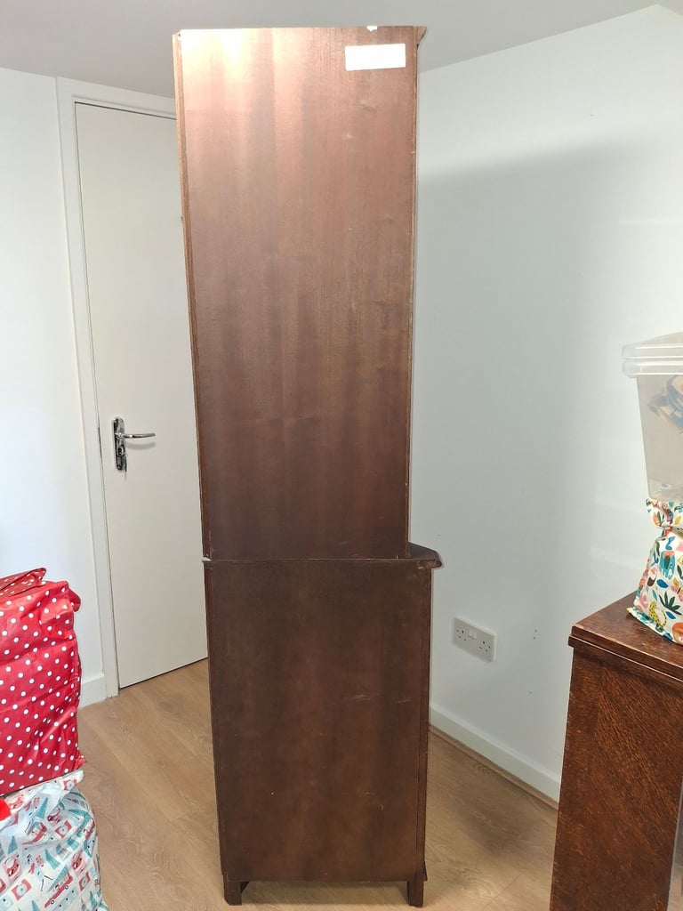 The Jaycee Vintage Oak Corner Display Cabinet is used but in very good condition.