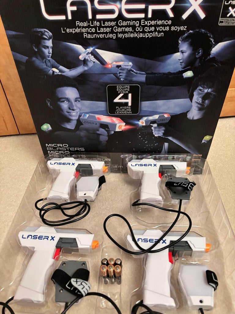 Laser X 4 Micro Blasters, 2 never used, excellent condition with box and batteries