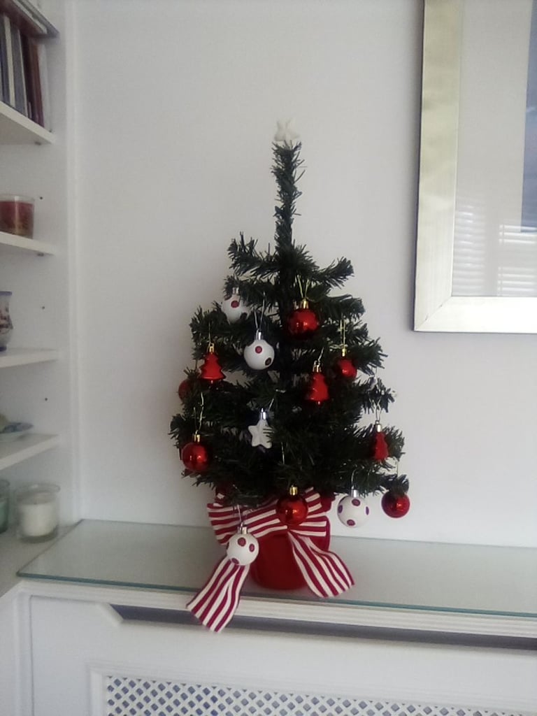 As new small Christmas tree with hanging baubles etc included.