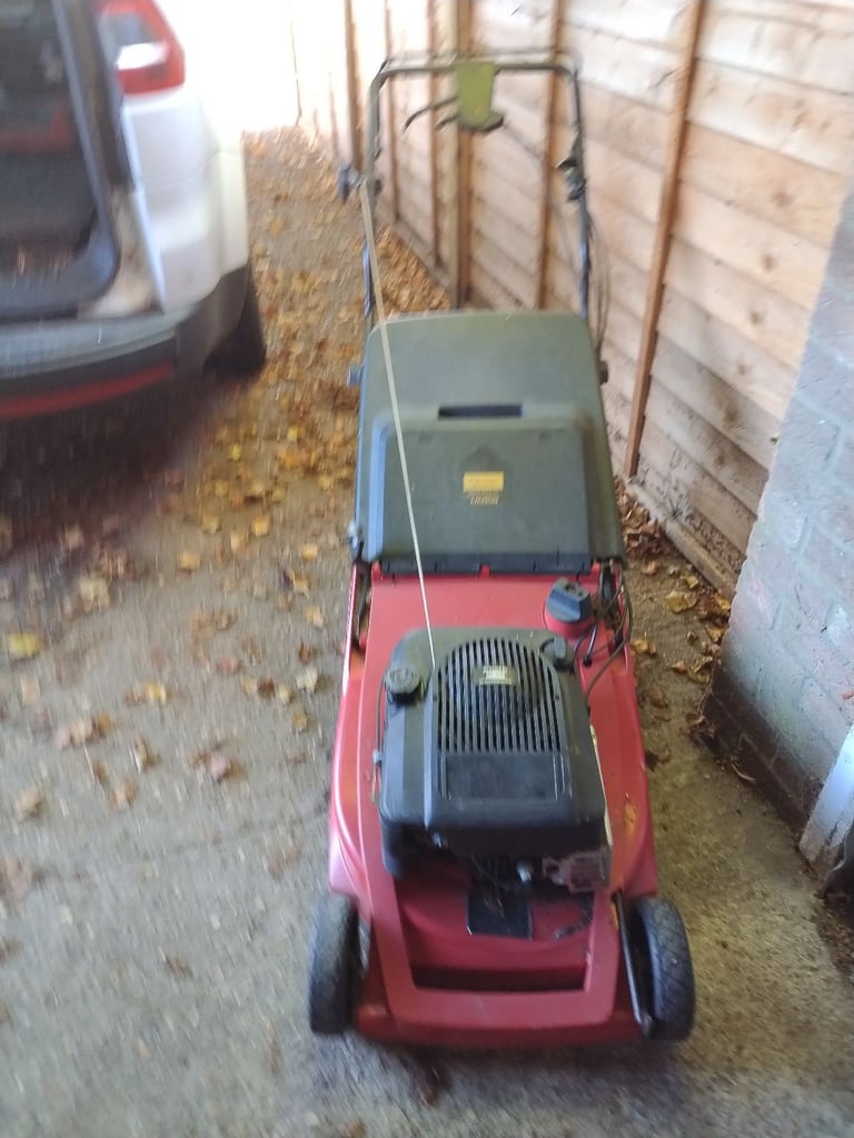 Petrol rotary lawnmower with grass box 4 stroke engine with height adjustment vgc gwo 