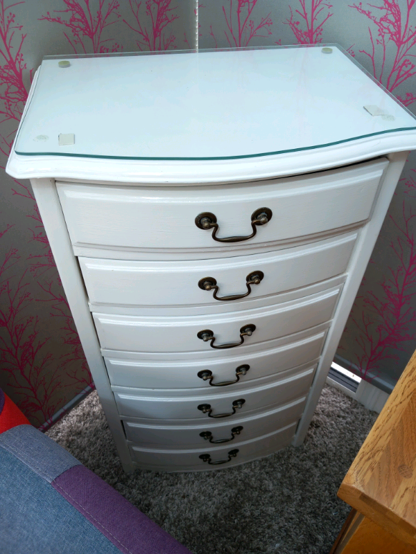 Tall wooden chest of drawers 