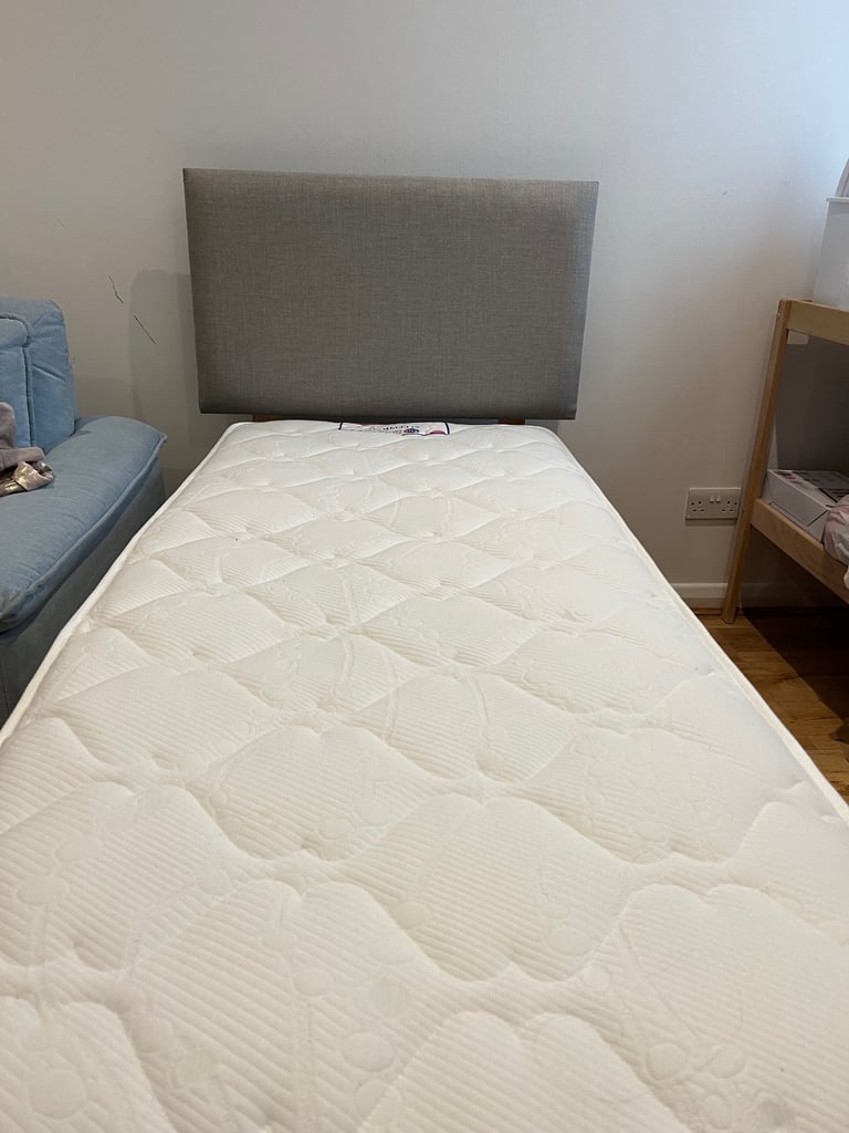 Single grey bed with new mattress 