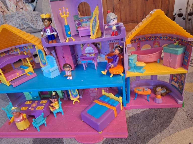 Kids play castle with furniture & people 