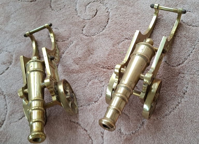 Vintage pair of large brass cannons