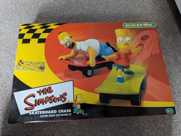 image for Scalextric The Simpsons Homer & Bart Skateboard Chase Racing Set LOCAL DROP OFF