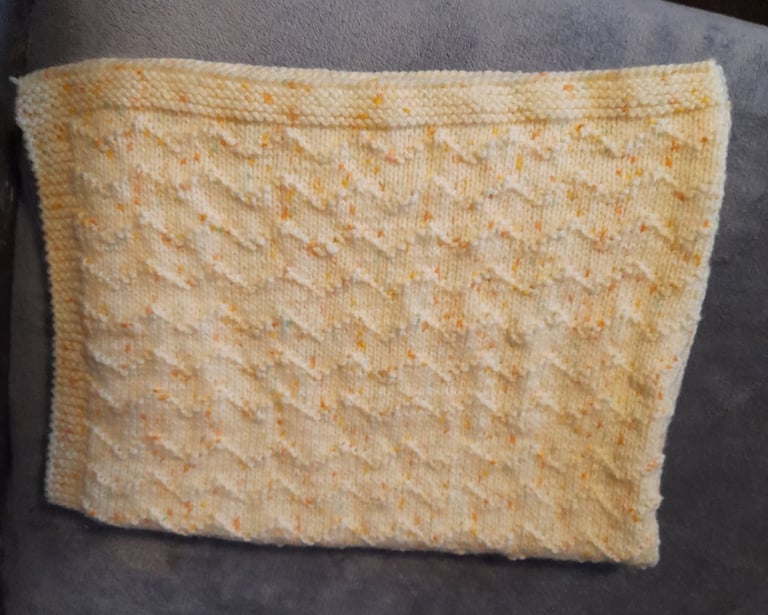 Hand knitted babies blanket 
