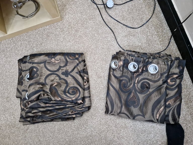 Long Eyelet Curtains. Each panel approx 280cm x 280cm 