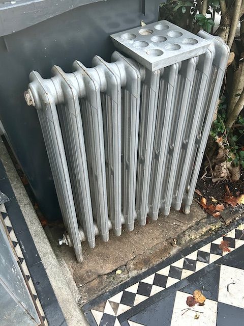 Iron old school radiator and aluminium candle tea light holder 