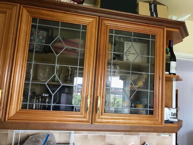 Used wooden and glass kitchen cabinet doors