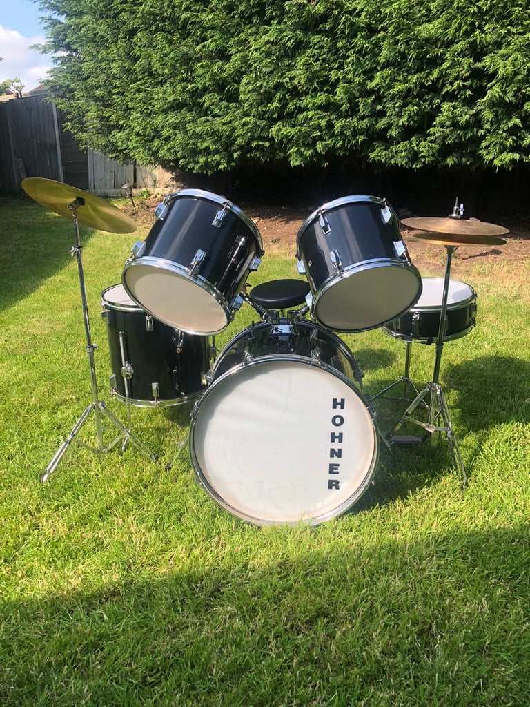 Full drum kit with stool, batters, symbols etc