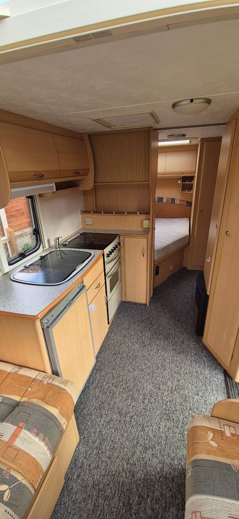 4 berth caravan fixed bed with motor mover 