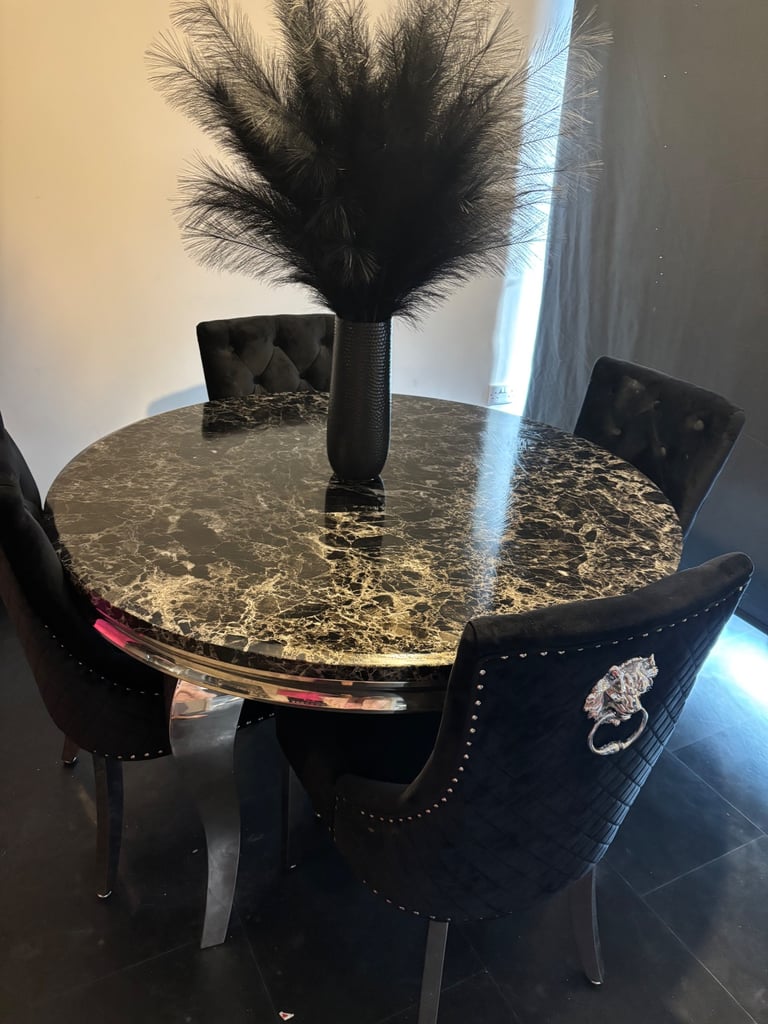 Black marble dinning table and chairs 