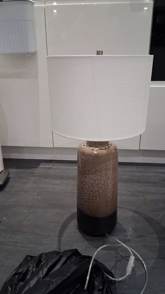 Quality lamp with white shade and 2 cream golden shades.  Almost new